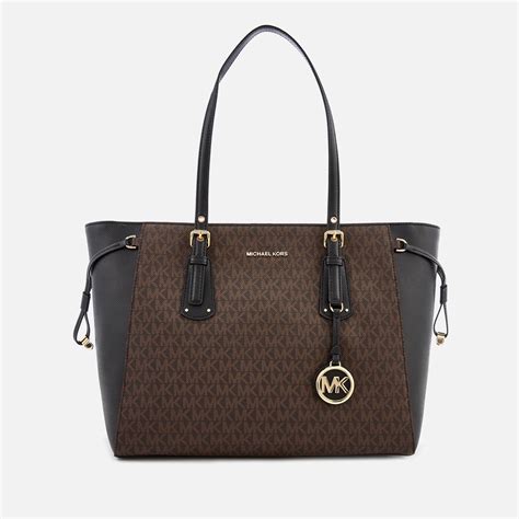 michael michael kors signature voyager multi function top zip tote|Michael Kors saffiano tote.